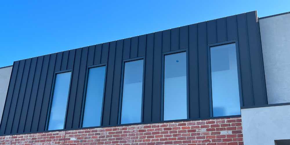 Comparison Between Wall Cladding and Brick - Total Roofing and Cladding